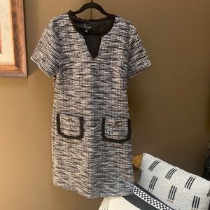 Connected dress neck and two pocket detail